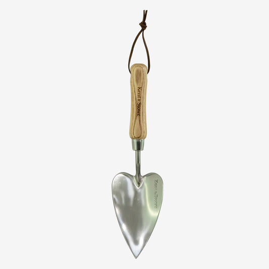 Metal garden trowel with wooden handle on a white background